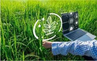 Farmer using modern agricultural techniques enabled through Meghdoot ecosystem